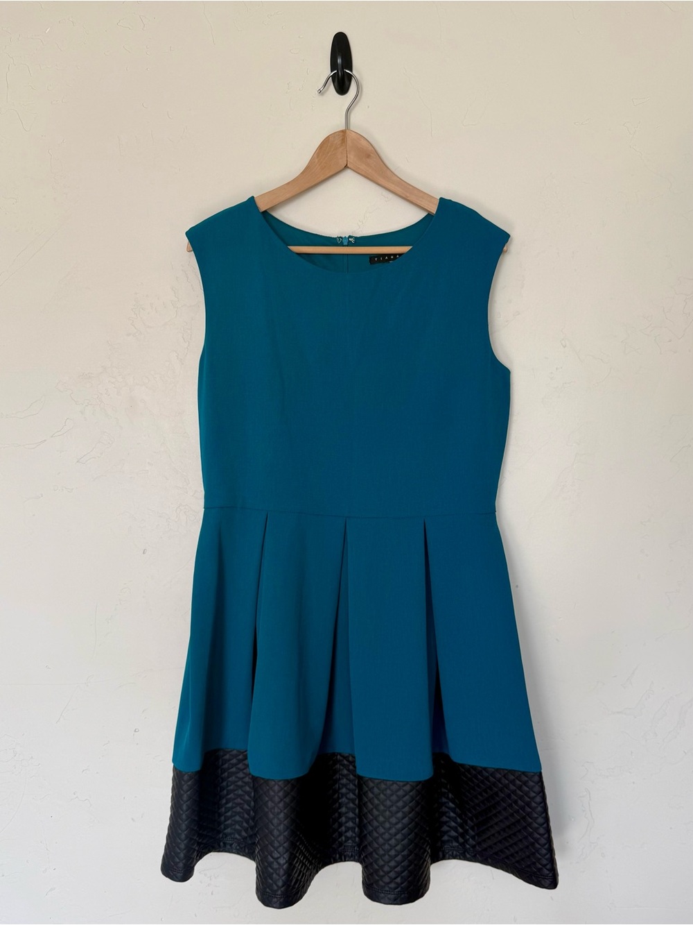 Tiana B. Teal Sleeveless Fit-and-Flare Dress with Black Quilted Hem